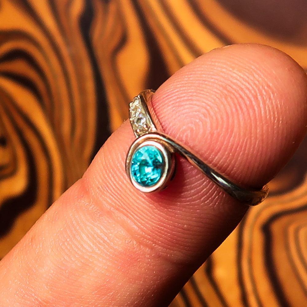 Sterling Silver Solitaire Band Ring with oval Cut Blue Zircon and 3 CZ - Size 5